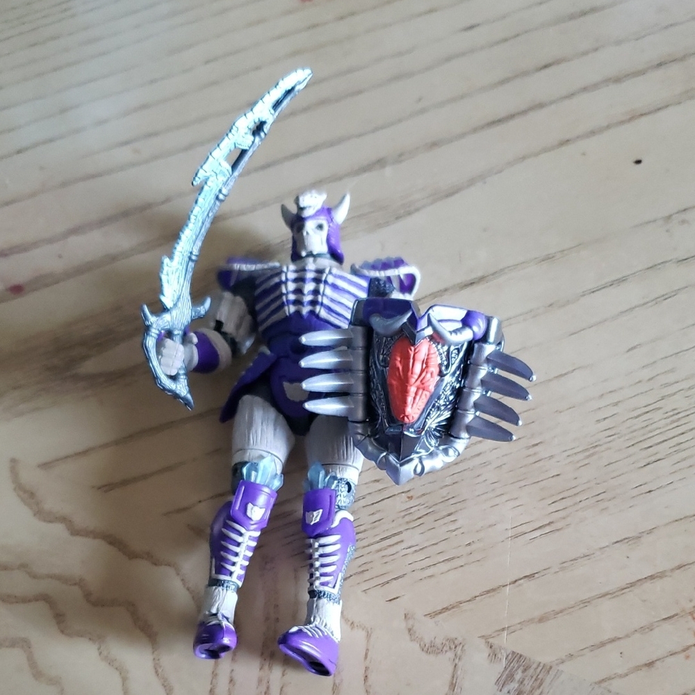 Purple and Silver Action Figure